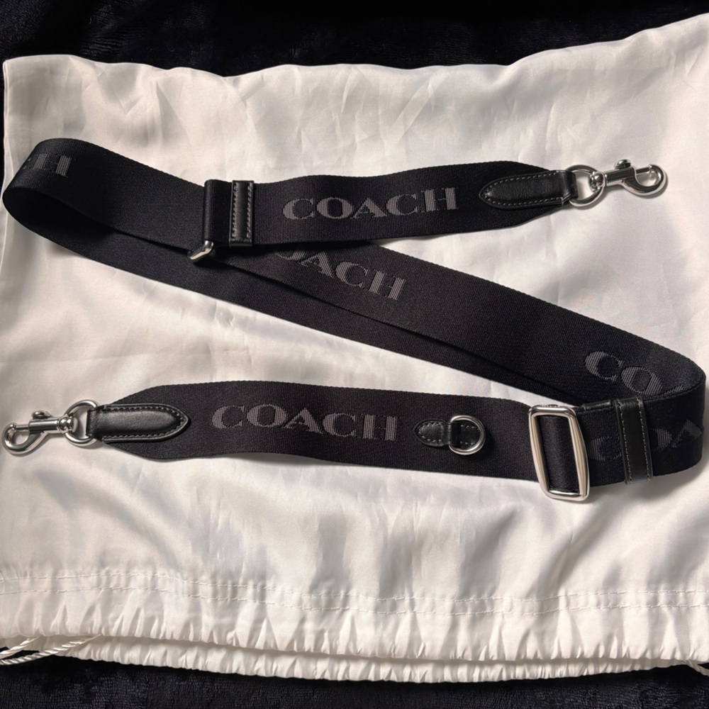 COACH Webbing Strap with black logo and silver hardware
